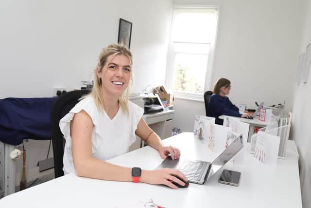 Hannah working alongside her sister Charlotte