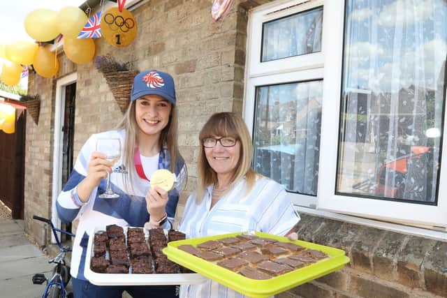 Allison with Charlotte's favourite brownies and millionaire's shortbread