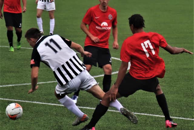 Action from Corby Town's final pre-season friendly of the summer as they claimed a 2-0 win at Eastwood CFC. Picture by David Tilley