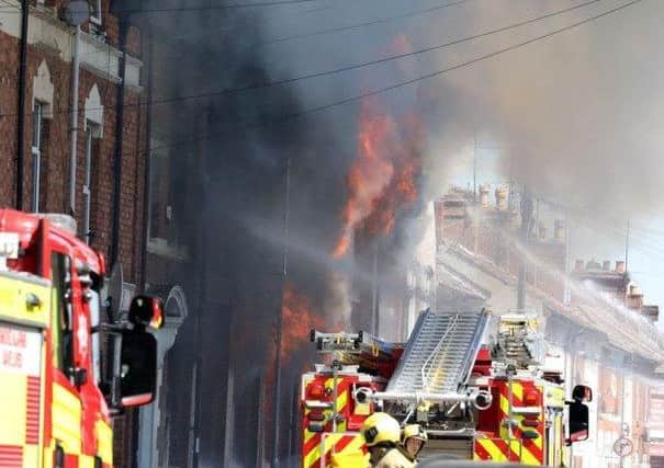 The fire raged through the building.