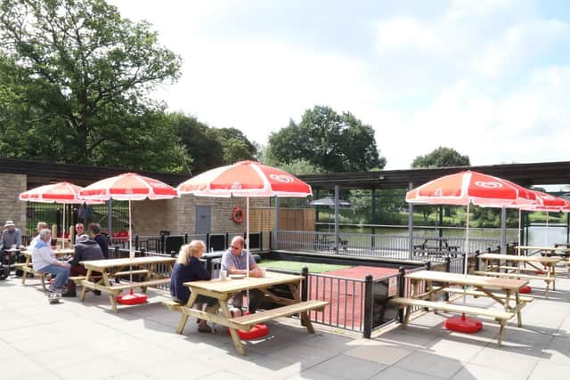 The outside seating area has great views across the lake