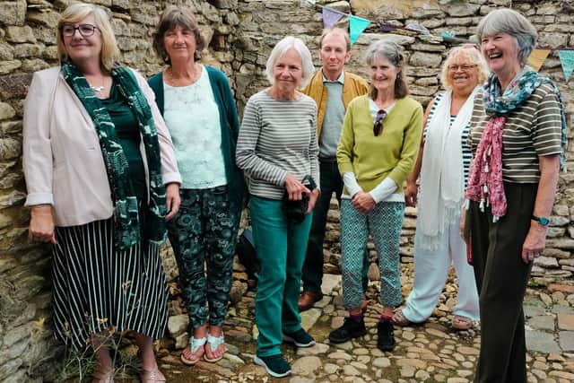 The launch of the Duchy Barn Garden in Higham Ferrers l-r Carol Fitzgerald, Pat Barber, Angelika Meachen, archaeological advisor Steve Morris, Mary Garratt, Olwen Mayes and Brenda Lofthouse.