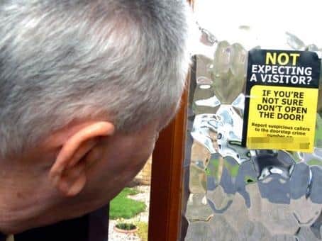 "If you're not sure, don't open the door" is the message from police combating distraction burglars and rogue traders.