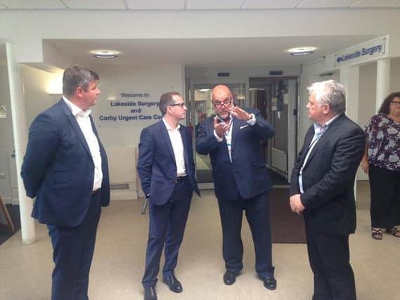 Professor Robert Harris in 2016 showing former Corby MP Andy Sawford, Labour leadership candidate Owen Smith and then leader of Corby Council Tom Beattie around the Lakeside building.