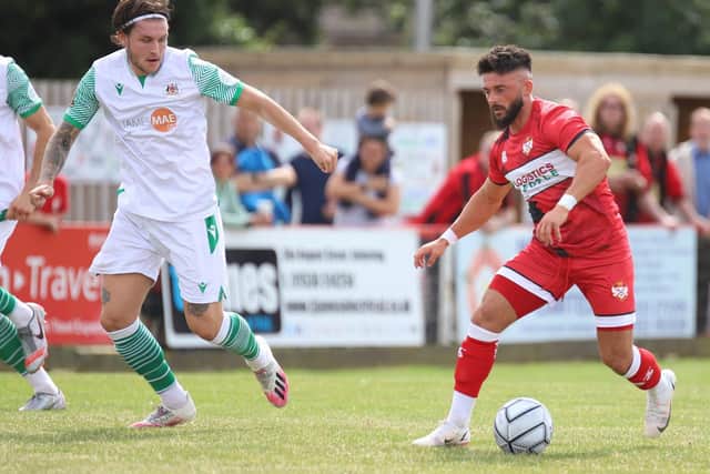 Callum Powell gets on the ball during the Poppies' victory