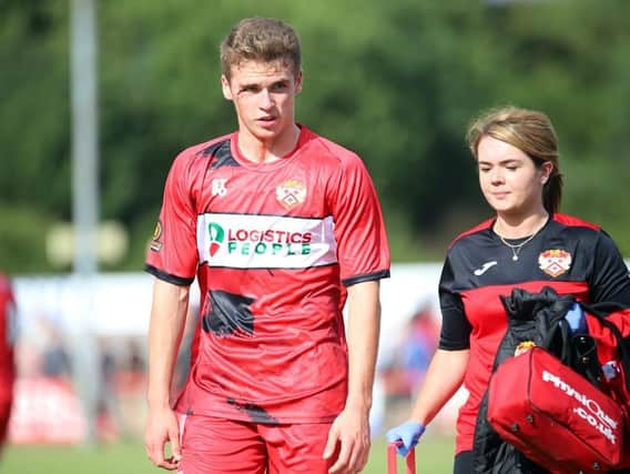 Max Dyche had the scars to show for the battle as he helped Kettering Town get off to a winning start at Latimer Park last weekend. Pictures by Peter Short
