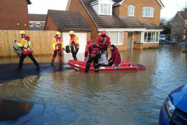 Some Kettering residents had to be rescued by boat during the Christmas floods