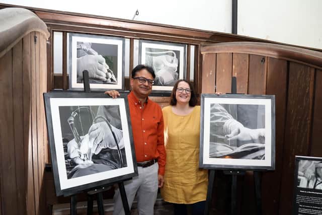 Dr Amit with Rah and the work that feature his hands