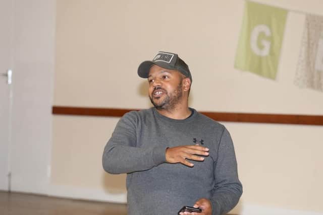 Quinton Green close the meeting with his poem Knife Sentence. Picture: Alison Bagley