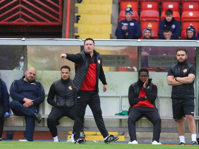 Paul Cox gives out instructions from the sidelines during Kettering Town's 3-1 defeat at Gateshead. Pictures by Peter Short
