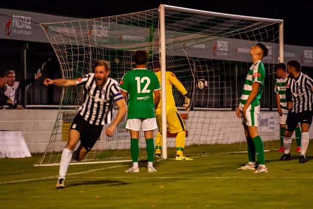 Gary Mulligan celebrates after scoring Corby Town's equaliser and the first of his two goals in their FA Cup replay success at Soham Town Rangers. Picture by Jim Darrah