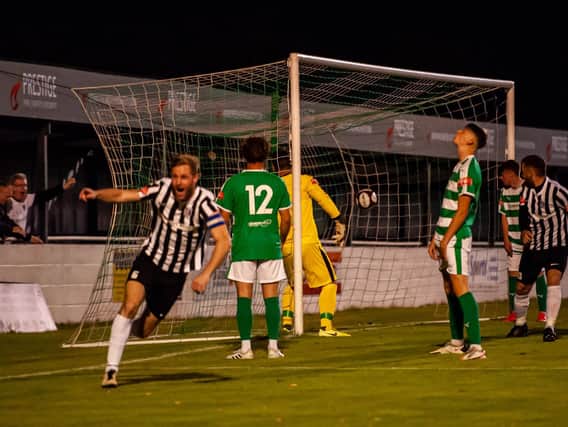 Gary Mulligan celebrates after scoring Corby Town's equaliser and the first of his two goals in their FA Cup replay success at Soham Town Rangers. Picture by Jim Darrah