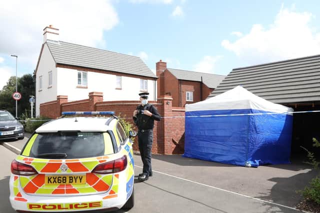 A forensic tent has been set up outside the property in Slate Drive, Kettering.