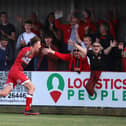 Isaac Stones heads off to celebrate after he gave Kettering Town the lead in their 1-1 draw with Farsley Celtic with his first league goal for the club. Pictures by Peter Short