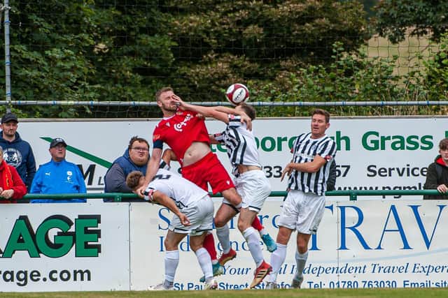 Action from Corby Town's 1-0 defeat at Stamford on Bank Holiday Monday. Picture by Jim Darrah