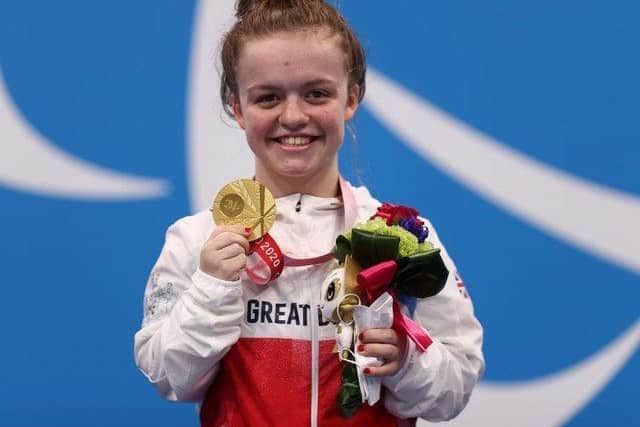 A delighted Maisie Summers-Newton on the podium.