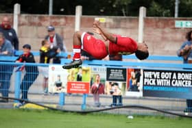 Decarrey Sheriff celebrates in style after his first goal of the season gave Kettering Town the lead in their 2-0 victory at Guiseley. Pictures by Peter Short