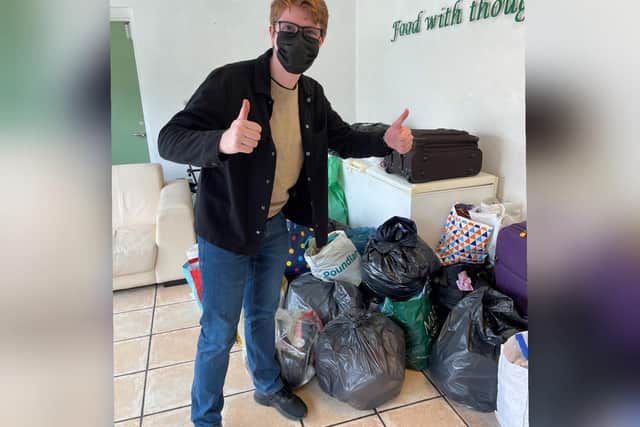 Cllr Seth Goddard with some of the donations
