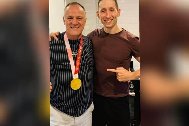 Graham (left) with high jump star Jonathan