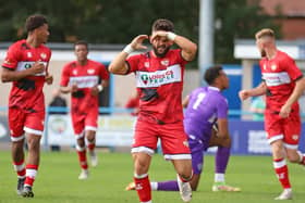 Callum Powell, pictured celebrating his goal at Guiseley last weekend, has been one of the standout performers for Kettering Town so far this season. Picture by Peter Short