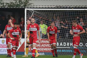 The look on the Kettering Town players' faces tells the story after the conceded a stoppage-time equaliser at Spalding United. Pictures by Peter Short