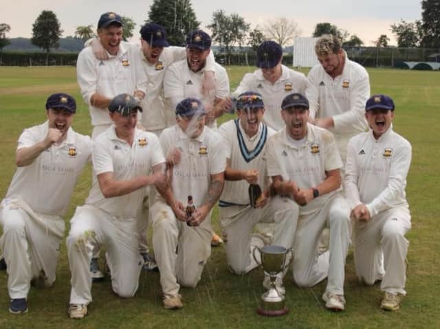 Loddington & Mawsley celebrate in style after they won the NCL Division One Knockout Cup. Picture by Colin Harrop