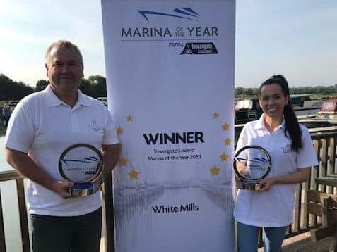 Operations manager at White Mills Marina, Gary Butcher and administrator, Kay Elderkin, with the 2020 and 2021 Inland Marina of the Year awards.