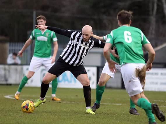 James Clifton has re-signed for Corby Town