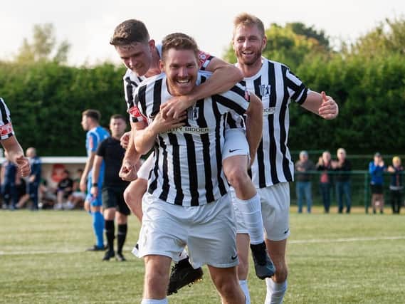Elliot Sandy celebrates his goal during Corby Town's 3-0 win at Yaxley. Picture by Jim Darrah