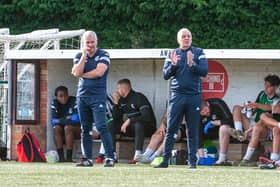 Corby Town manager Gary Mills and assistant Darron Gee watch on during the 3-0 win at Yaxley last weekend. Picture by Jim Darrah