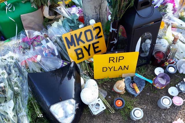 Tributes left at the spot where teenager Dylan Holliday died in August