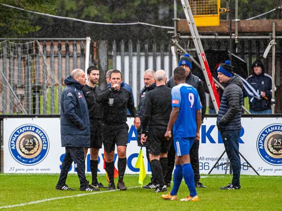Referee Ashley Allen brought proceedings to a halt due to a waterlogged pitch at Steel Park after consulting with both managers. Pictures by Jim Darrah