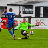 Corby Town goalkeeper Matt Hall clears the ball during the abandoned clash with Sutton Coldfield Town last weekend. Picture by Jim Darrah