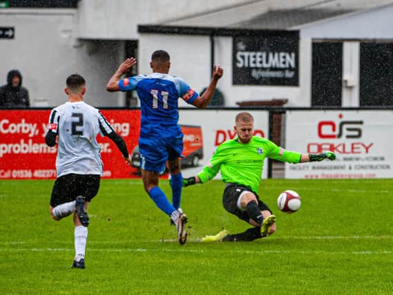 Corby Town goalkeeper Matt Hall clears the ball during the abandoned clash with Sutton Coldfield Town last weekend. Picture by Jim Darrah