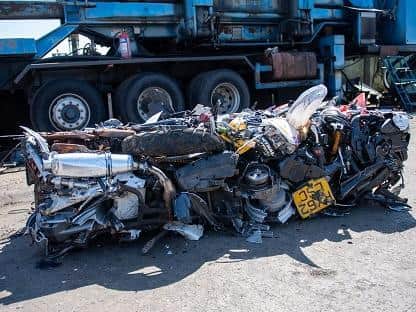 This pile of metal is a number of motorbikes seized under anti-social behaviour laws