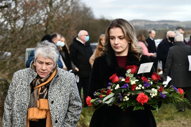 Floral tributes were left in remembrance of the workmen who were killed at Teebane. Picture: Colm Lenaghan/Pacemaker Press