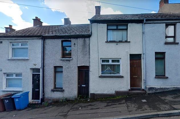 A terrace house in Mill Brae, Larne is currently on the market with an asking price of £50,000.