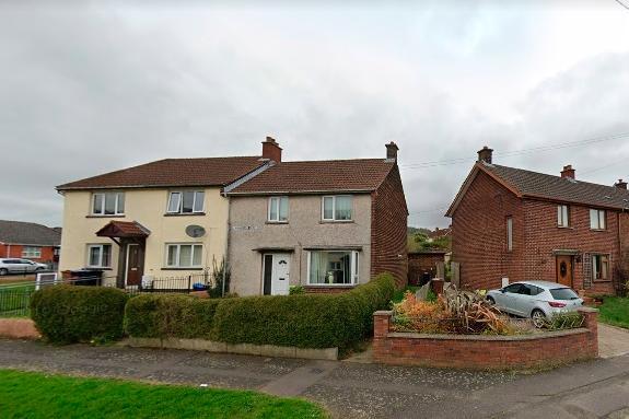 An end terrace house on Carnreagh Bend in Newtownabbey is on the market with an asking price of £59,950.