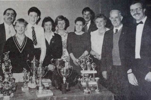 Prizewinners of the All Saints Bowling Club pictured with their trophies at their annual prizegiving dinner.
1989