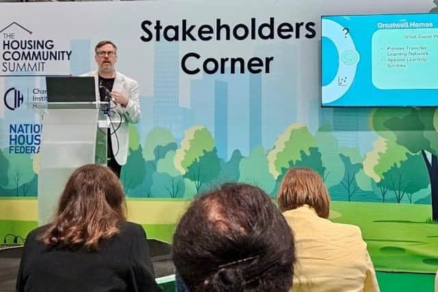 Chris Holloway speaking at the National Housing Community Summit