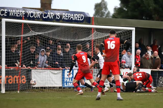 George Cooper's stoppage-time goal earned Kettering Town a dramatic 3-3 draw with Chorley at Latimer Park. Pictures by Peter Short