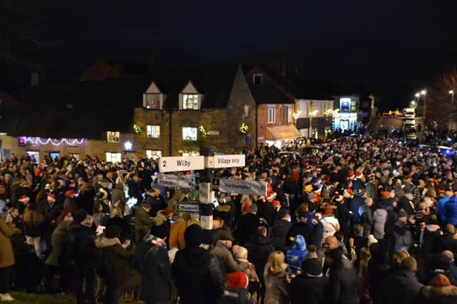 The annual Carols on the Square service saw thousands from Earls Barton and beyond visit the village to sing festive tunes this Christmas Eve