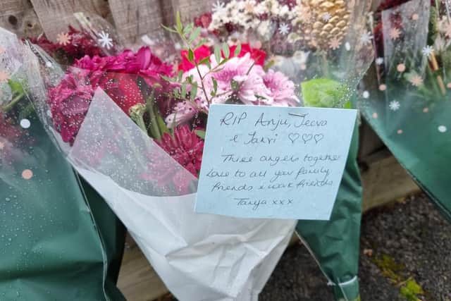 Flowers left at the scene of the triple murder at Petherton Court, Kettering