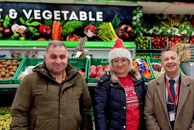 Seyfettin, from the Food Centre, with bread maker Renata and Serve fundraising manager Nick Tite