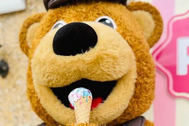 Wicky Bear tucks into the ice-cream