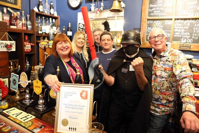 The staff of the Little Ale House celebrate