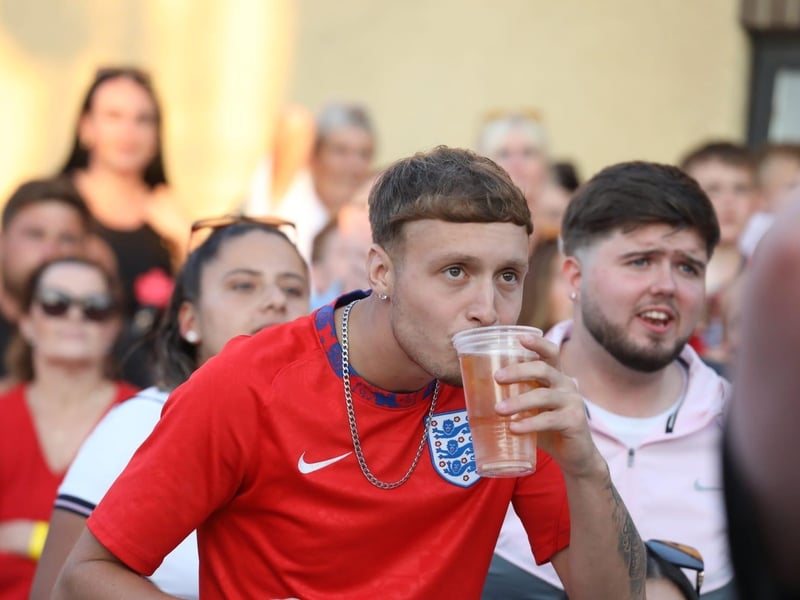 Fans at the Kettering Town FC World Cup Fan Zone watch England vs Argentina in the semi-final