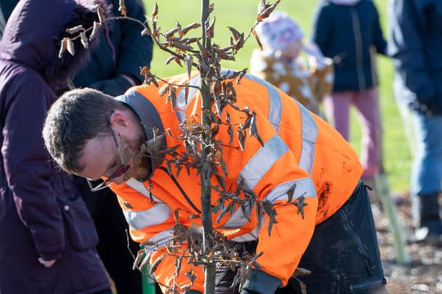 Tree planting at a recent RAIN event, in Oakley Vale - Corby.