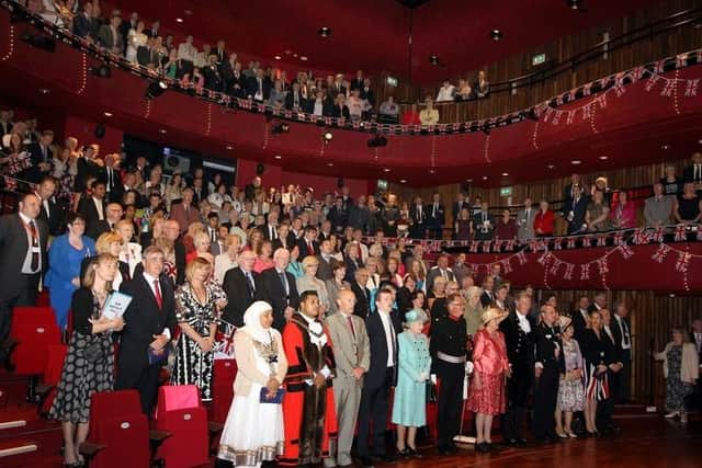 In The Core Theatre, Corby - Queen Elizabeth II surrounded by VIPs
