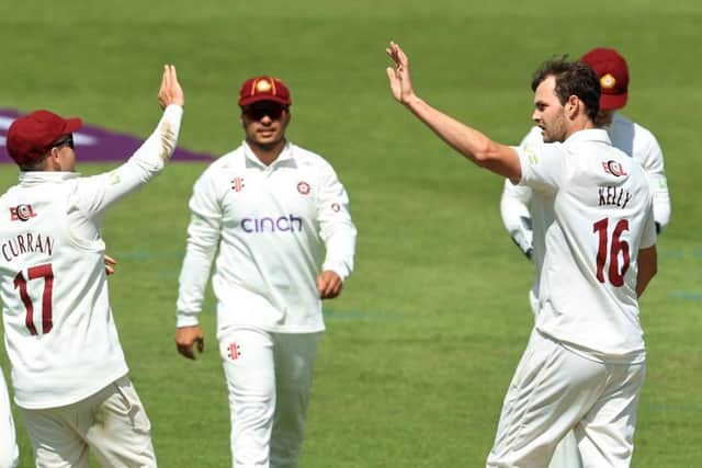 Matt Kelly celebrates after taking the wicket of Zak Crawley